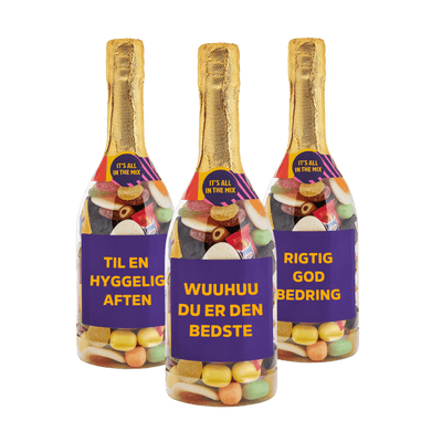 Her vises 3 champagne flasker som har bland selv slik inden i
