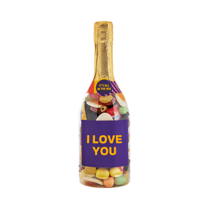 Champagneflaske fyldt med Favorit Mix – et farverigt slikmix, og teksten I LOVE YOU på etiketten. Gaveidé fra SlikEkspressen.