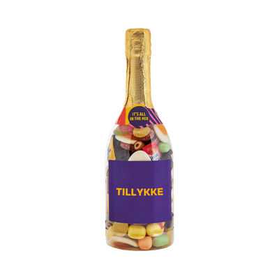 Champagneflaske fyldt med Favorit Mix og label med “Tillykke” – sød gaveidé fra SlikEkspressen.