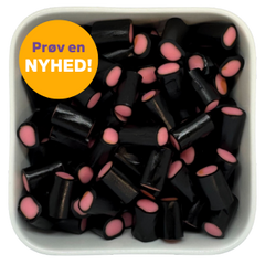 Jordbær Lakrids Bidder fra PusPus – sorte lakridsstykker med rosa jordbærfyldning. Nyhed hos SlikEkspressen.