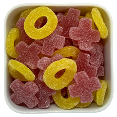 Kryds og Bolle fra Malaco – vingummi med frugtsmag i form af X'er og O'er.