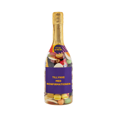 Champagneflaske med “Tillykke med Nonfirmationen”-label og Favorit Mix-slik – ideel som gave eller pynt til nonfirmationsfesten.